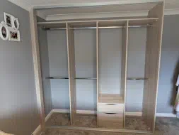Navara ash sliding wardrobe with lots of hanging and couple of drawer, installed in Thornaby